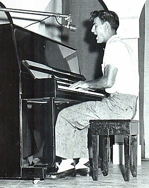 Al, as B. Bumble, stinging the keys